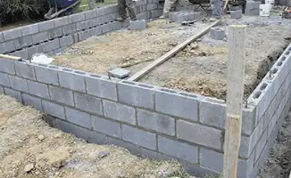 Professionals building a foundation with blocks in Los Angeles, CA