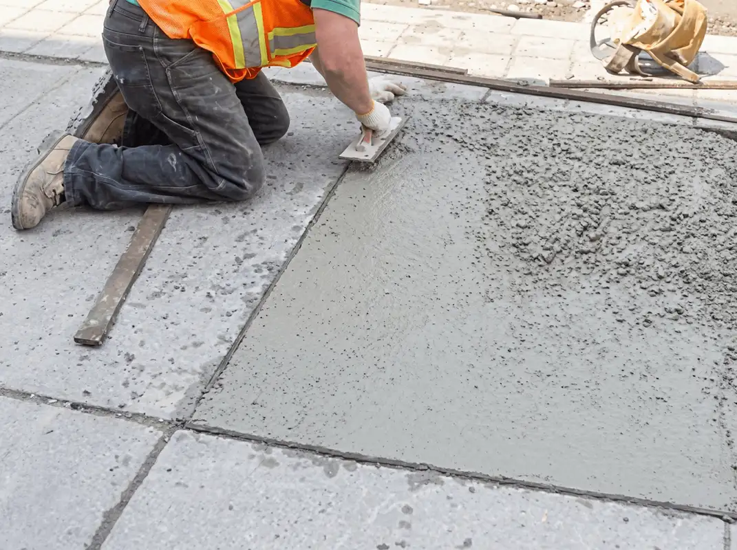 Professional repairing a concrete floor in Los Angeles, CA